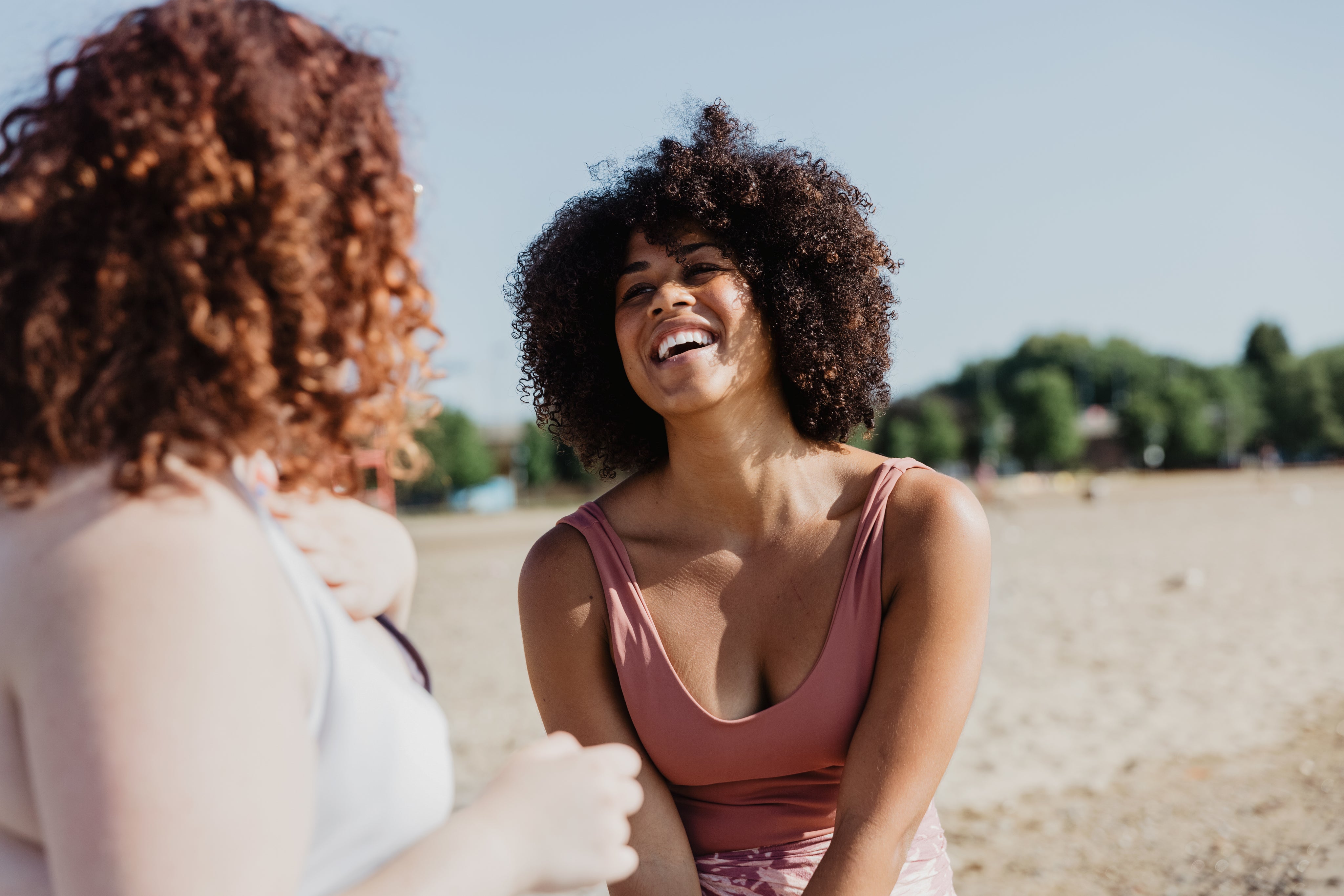 files/young-woman-in-bikini-laughs-with-friends.jpg